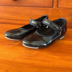 Black patent tap dance shoes